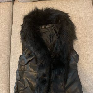 Womenswear’s Black Fur Faux Vest Jacket.